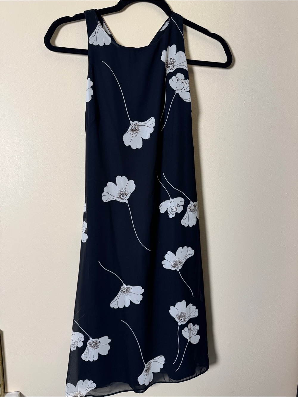 Sleeveless Black Midi Dress with White Floral Print